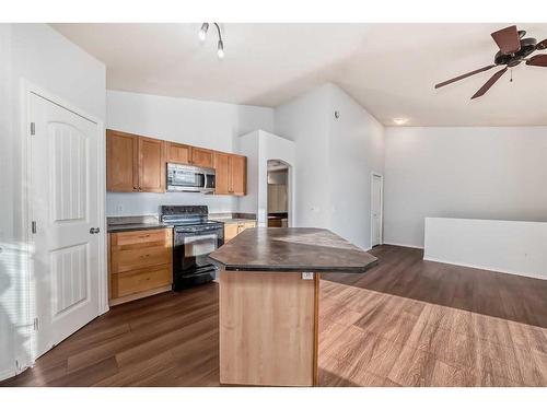 202-100 Panatella Landing Nw, Calgary, AB - Indoor Photo Showing Kitchen