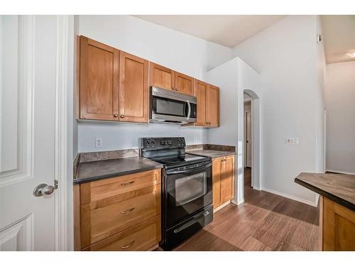 202-100 Panatella Landing Nw, Calgary, AB - Indoor Photo Showing Kitchen