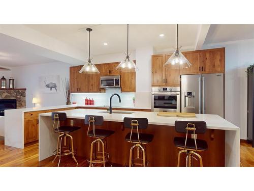 614 8Th Avenue Sw, Canmore, AB - Indoor Photo Showing Kitchen With Upgraded Kitchen