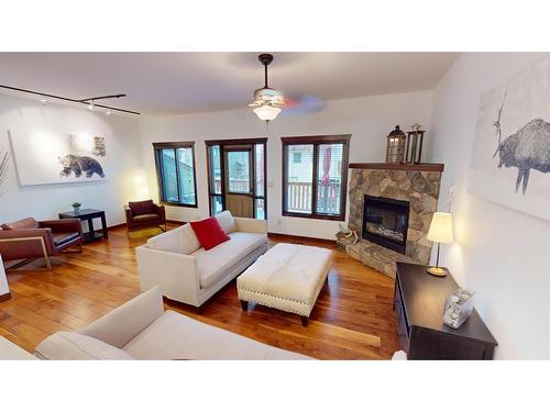 614 8Th Avenue Sw, Canmore, AB - Indoor Photo Showing Living Room With Fireplace