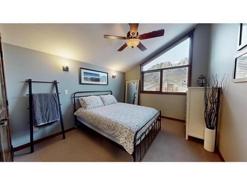 614 8Th Avenue Sw, Canmore, AB - Indoor Photo Showing Bedroom