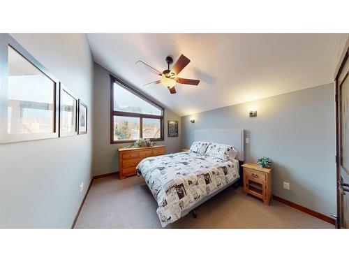 614 8Th Avenue Sw, Canmore, AB - Indoor Photo Showing Bedroom