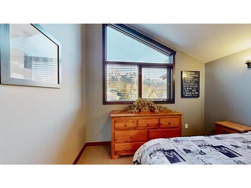 614 8Th Avenue Sw, Canmore, AB - Indoor Photo Showing Bedroom