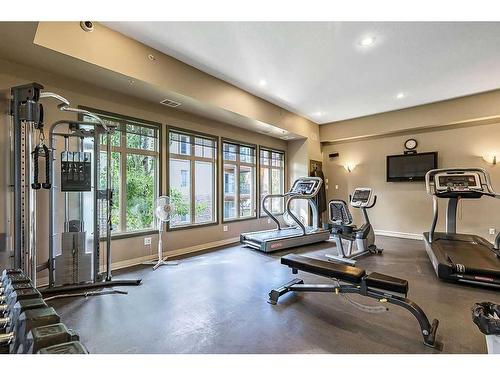 3401-92 Crystal Shores Road, Okotoks, AB - Indoor Photo Showing Gym Room