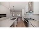 330 Sage Hill Circle Nw, Calgary, AB  - Indoor Photo Showing Kitchen With Stainless Steel Kitchen With Double Sink With Upgraded Kitchen 