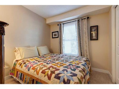 231 Deerpoint Lane Se, Calgary, AB - Indoor Photo Showing Bedroom