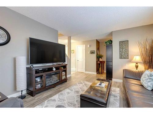 231 Deerpoint Lane Se, Calgary, AB - Indoor Photo Showing Living Room