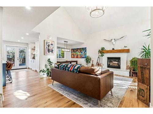 26 Shawbrooke Close Sw, Calgary, AB - Indoor Photo Showing Living Room With Fireplace