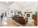 26 Shawbrooke Close Sw, Calgary, AB  - Indoor Photo Showing Living Room With Fireplace 