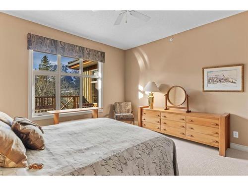 303-3 Aspen Glen, Canmore, AB - Indoor Photo Showing Bedroom