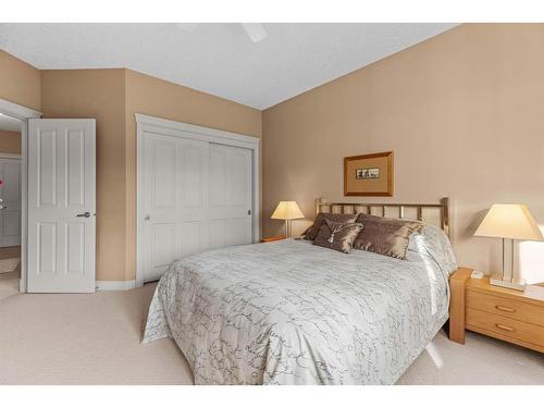 303-3 Aspen Glen, Canmore, AB - Indoor Photo Showing Bedroom