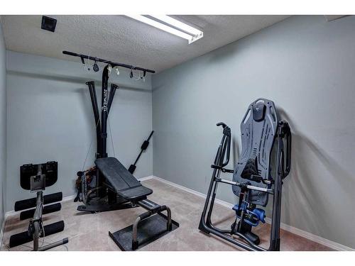 27 Castleridge Road Ne, Calgary, AB - Indoor Photo Showing Gym Room