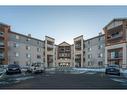 2403-505 Railway Street West, Cochrane, AB  - Outdoor With Facade 