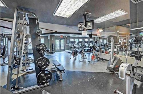 2511-11811 Lake Fraser Drive Se, Calgary, AB - Indoor Photo Showing Gym Room