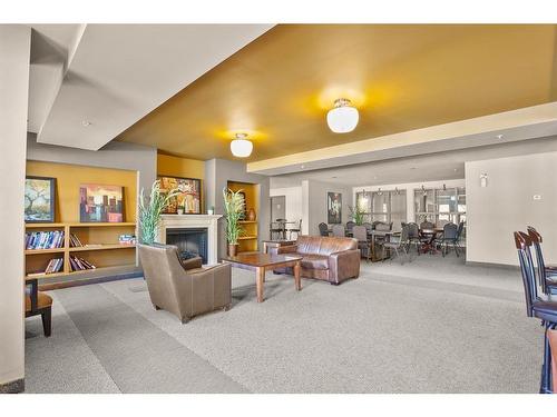 2511-11811 Lake Fraser Drive Se, Calgary, AB - Indoor With Fireplace