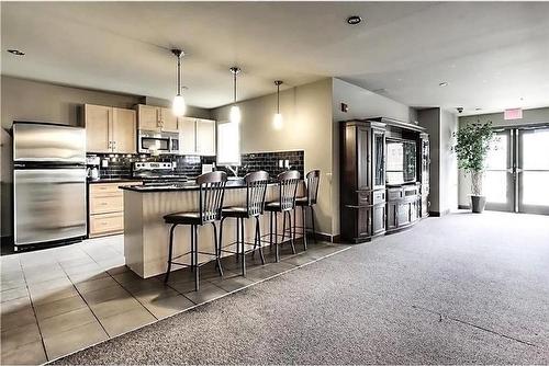 2511-11811 Lake Fraser Drive Se, Calgary, AB - Indoor Photo Showing Kitchen