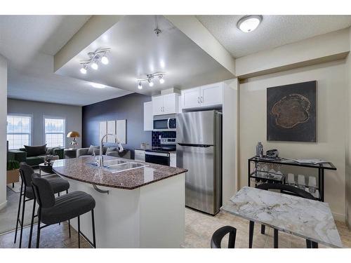 2511-11811 Lake Fraser Drive Se, Calgary, AB - Indoor Photo Showing Kitchen With Double Sink