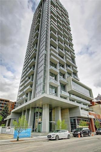 1608-930 16 Avenue Sw, Calgary, AB - Outdoor With Facade