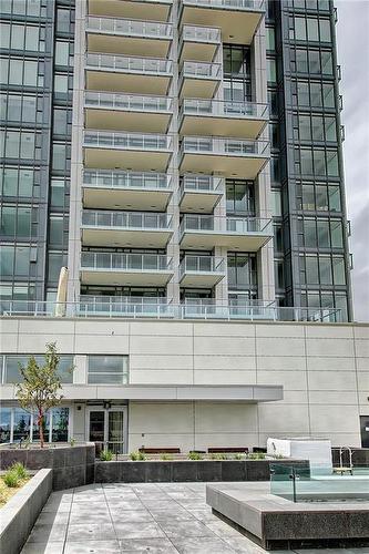 1608-930 16 Avenue Sw, Calgary, AB - Outdoor With Facade