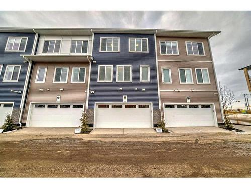 102-6 Merganser Drive West, Chestermere, AB - Outdoor With Facade