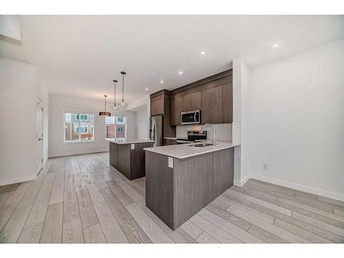 102-6 Merganser Drive West, Chestermere, AB - Indoor Photo Showing Kitchen