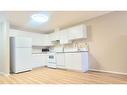 220-260 Shawville Way Se, Calgary, AB  - Indoor Photo Showing Kitchen With Double Sink 