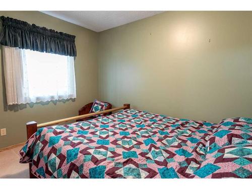 212 Riverstone Place Se, Calgary, AB - Indoor Photo Showing Bedroom