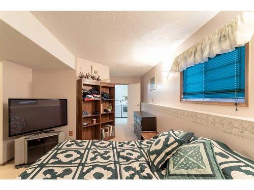 212 Riverstone Place Se, Calgary, AB - Indoor Photo Showing Bedroom