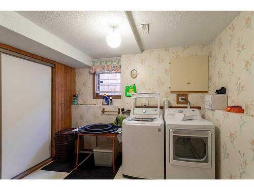 212 Riverstone Place Se, Calgary, AB - Indoor Photo Showing Laundry Room