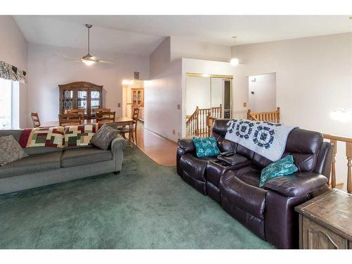 212 Riverstone Place Se, Calgary, AB - Indoor Photo Showing Living Room