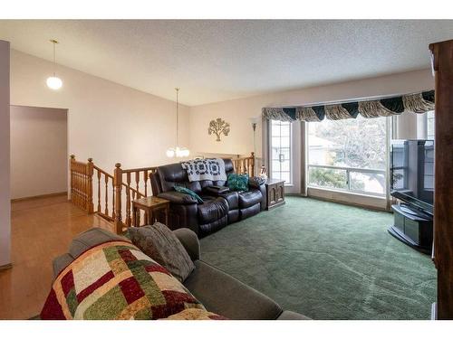 212 Riverstone Place Se, Calgary, AB - Indoor Photo Showing Living Room