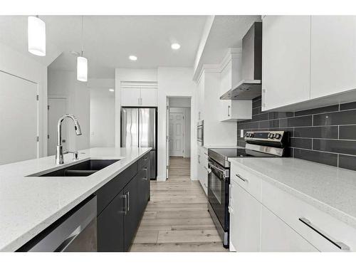 105 Legacy Glen Circle Se, Calgary, AB - Indoor Photo Showing Kitchen With Stainless Steel Kitchen With Double Sink With Upgraded Kitchen