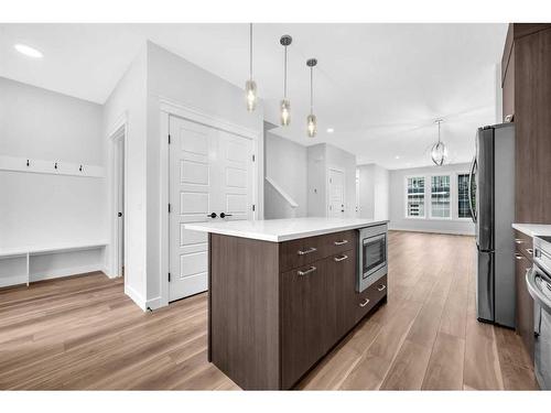 118 Versant View Sw, Calgary, AB - Indoor Photo Showing Kitchen With Upgraded Kitchen