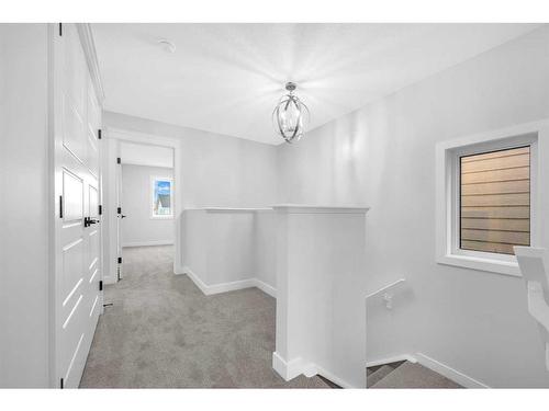 118 Versant View Sw, Calgary, AB - Indoor Photo Showing Other Room