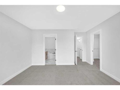 118 Versant View Sw, Calgary, AB - Indoor Photo Showing Other Room