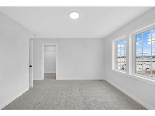 118 Versant View Sw, Calgary, AB - Indoor Photo Showing Other Room