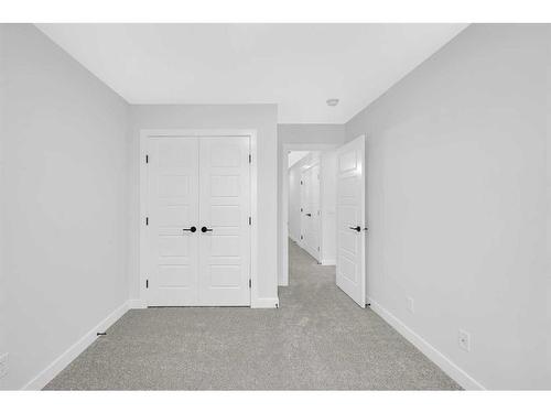 118 Versant View Sw, Calgary, AB - Indoor Photo Showing Other Room