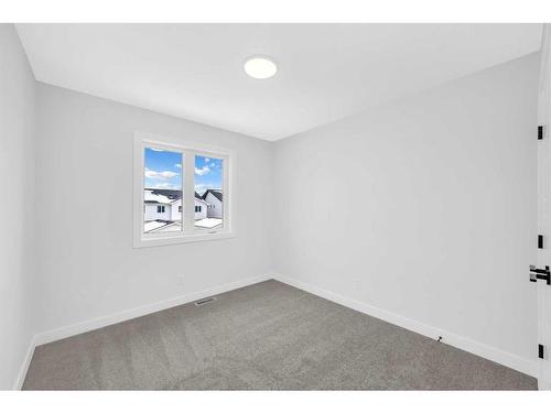 118 Versant View Sw, Calgary, AB - Indoor Photo Showing Other Room