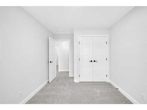 118 Versant View Sw, Calgary, AB - Indoor Photo Showing Other Room