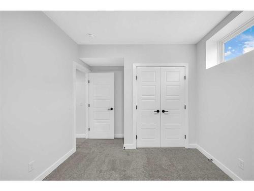 118 Versant View Sw, Calgary, AB - Indoor Photo Showing Other Room