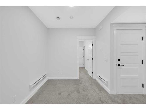 118 Versant View Sw, Calgary, AB - Indoor Photo Showing Other Room