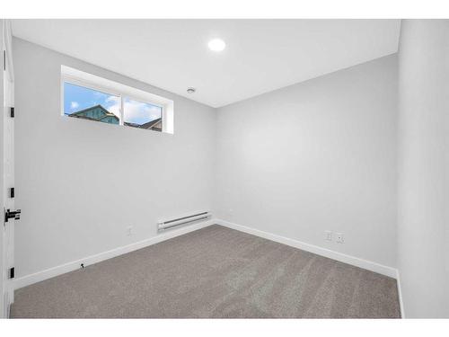 118 Versant View Sw, Calgary, AB - Indoor Photo Showing Other Room