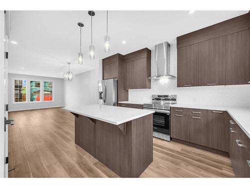 118 Versant View Sw, Calgary, AB - Indoor Photo Showing Kitchen With Upgraded Kitchen