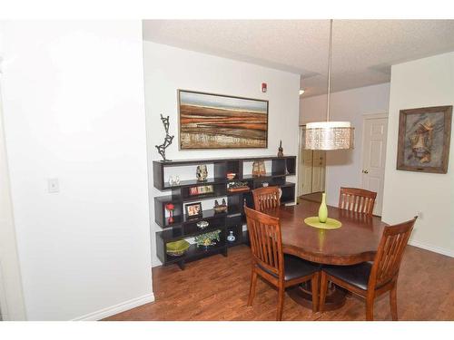 305-6800 Hunterview Drive Nw, Calgary, AB - Indoor Photo Showing Dining Room