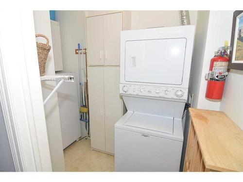 305-6800 Hunterview Drive Nw, Calgary, AB - Indoor Photo Showing Laundry Room