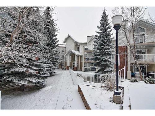 305-6800 Hunterview Drive Nw, Calgary, AB - Outdoor With Balcony With Facade