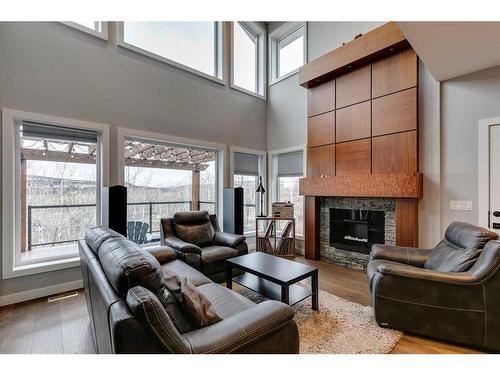 243 Cottageclub Crescent, Rural Rocky View County, AB - Indoor Photo Showing Living Room With Fireplace