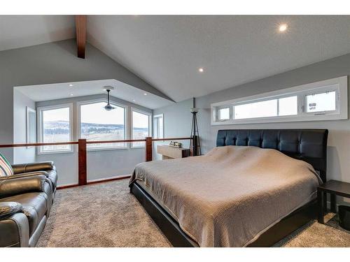 243 Cottageclub Crescent, Rural Rocky View County, AB - Indoor Photo Showing Bedroom