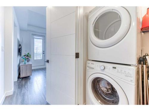 1308-350 Livingston Common Ne, Calgary, AB - Indoor Photo Showing Laundry Room