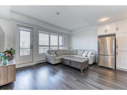 1308-350 Livingston Common Ne, Calgary, AB - Indoor Photo Showing Living Room